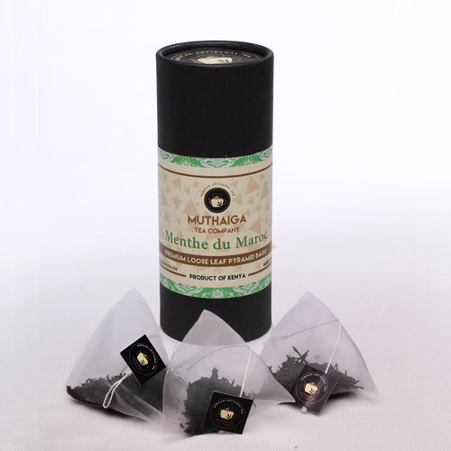 A package of Muthiga brand 'Menthe du Maroc' (green tea),  a Bedtime tea, with biodegradable bags displayed in front.