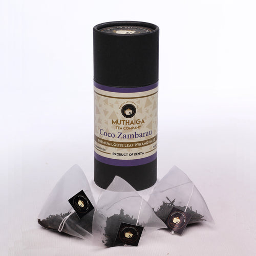 Product packaging and pyramid of the Best Purple Tea Bags for Muthaiga Coco Zambarau loose leaf tea.