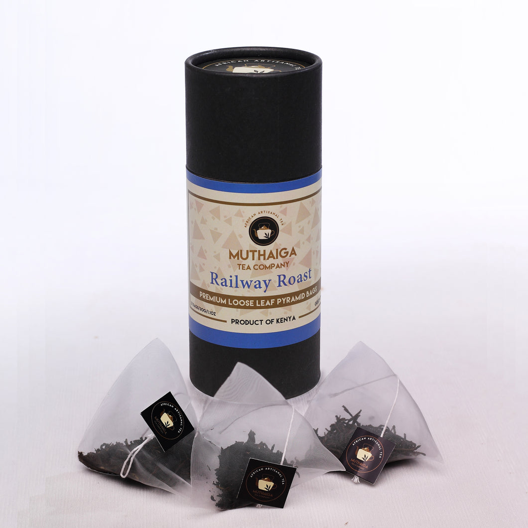 A package of Muthaiga Railway Roast loose leaf green tea benefits with pyramid bags displayed in front.