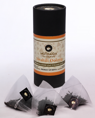 Product image of Muthaiga Swahili Oolong loose leaf tea, showcasing the Oolong tea bags in Kenya and the packaging cylinder with brand and product information.