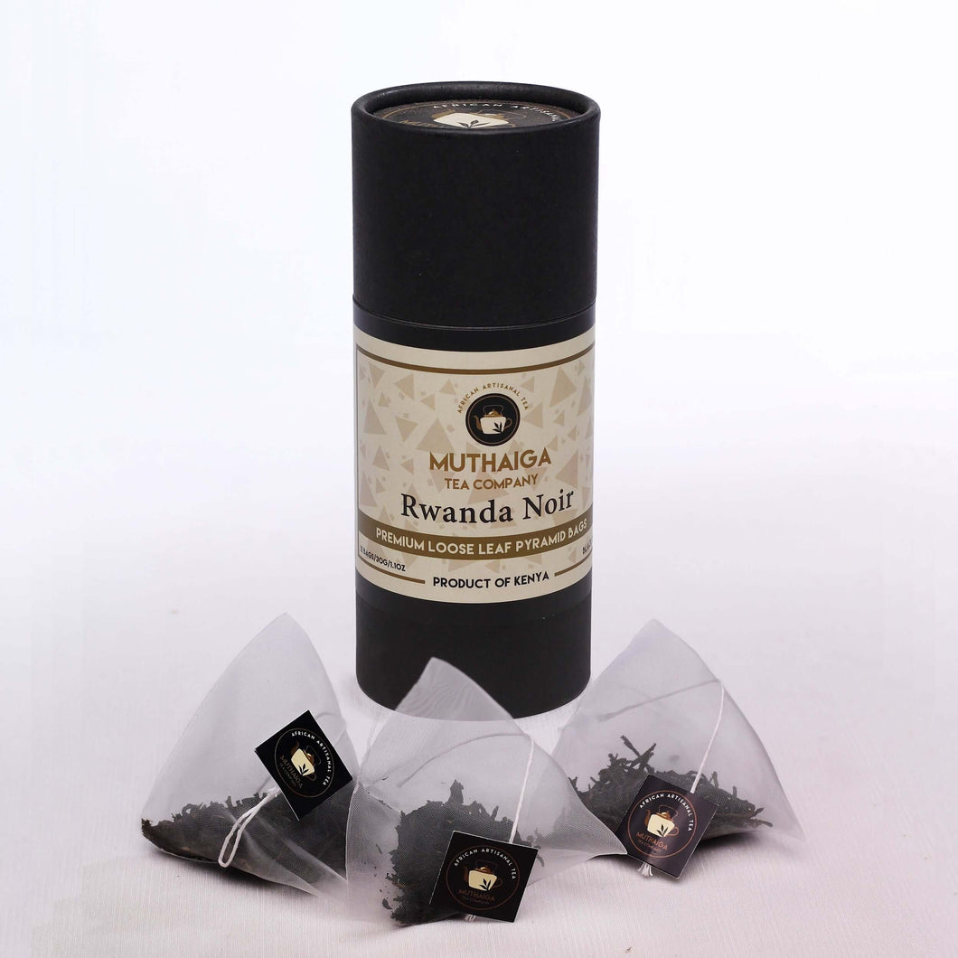 A tube containing tea bags of Rwanda Noir - a loose leaf black tea in Kenya by Muthaiga Tea